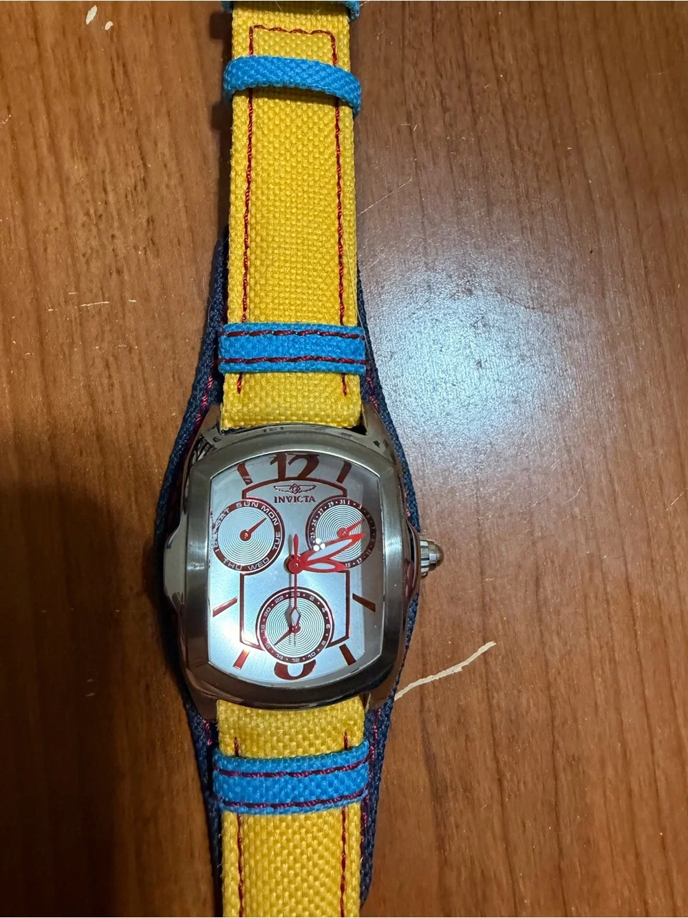 Invicta Yellow and Blue Women's Fabric Strap Watch with Silver Dial